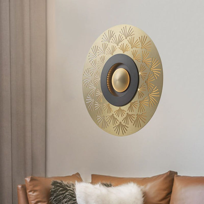Create a cozy ambiance with the warm glow of the Agula Wall Lamp.