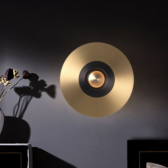 Experience the perfect blend of form and function with the Agula Wall Lamp.