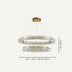 Chandelier with two circular tiers, clear glass finish, dimensions 15.7” + 23.6” wide, 7.9” high, on a white background.