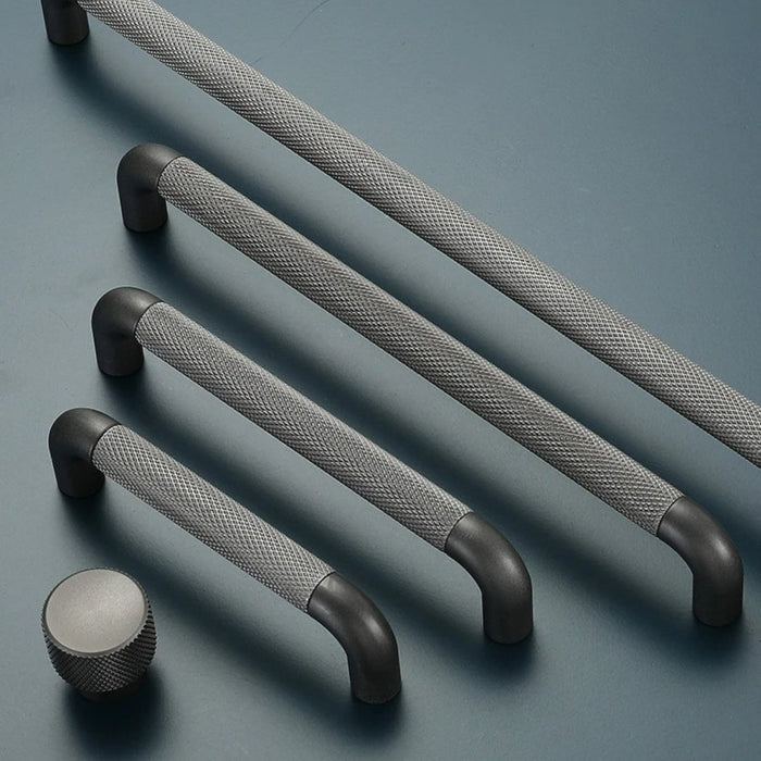 Enhance the aesthetic appeal of your furniture with the modern flair of the Alyma Knob & Pull Bar.