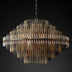 Round chandelier with metallic finish, featuring vertical rods. Dimensions not specified. Elegant lighting solution for any r