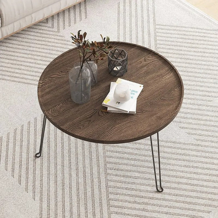 Transform your lounge area into a stylish haven with the sleek and practical design of the Anake Coffee Table, ideal for both everyday use and entertaining guests.
