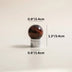 Red tiger's eye stone knob with polished chrome base on neutral background.