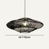 Black woven pendant light with organic oval shape suspended against white background.
