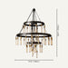 Add a touch of glamour to your home décor with the Betsy Chandelier's dazzling crystal accents and refined design, elevating any room with its radiant presence.