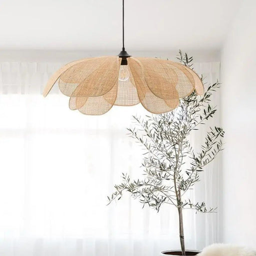 The Bloma Pendant Light exudes elegance and sophistication, featuring a graceful floral-inspired design that adds a touch of natural beauty to any room.