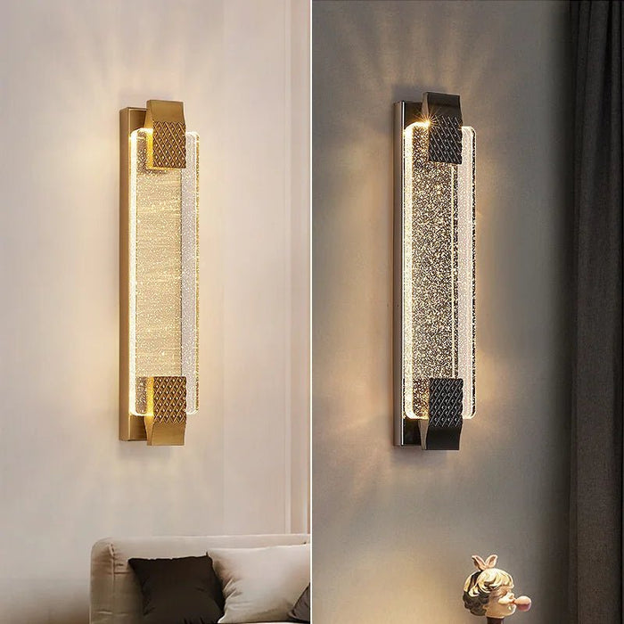 Brage Crystal Wall Light: Adorned with sparkling crystals and polished chrome accents, this wall light exudes elegance and luxury, casting a dazzling display of light and shadow.