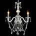Clear crystal chandelier with three lit candle-style arms and hanging crystal drops on black background.
