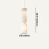 Cream ribbed pendant light with hourglass shape suspended against white background.