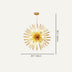 Gold starburst pendant chandelier with radiating rods on cream background, 50cm diameter.