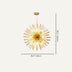 Gold starburst chandelier with radiating rods suspended against a neutral background.