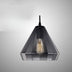 Black geometric pendant light with Edison bulb visible inside, suspended against white background.