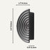 Black concentric circular drawer pull with ribbed metal finish, shown against light background.