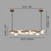 Wood and floral LED linear light fixture with 39.3-inch length and floral-shaped bulbs, hangs against a plain gray background