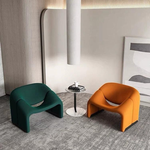 Podium Modern Accent Chair: Sleek and stylish, this modern accent chair boasts clean lines and a minimalist design, making it the perfect statement piece for contemporary interiors seeking a touch of sophistication.