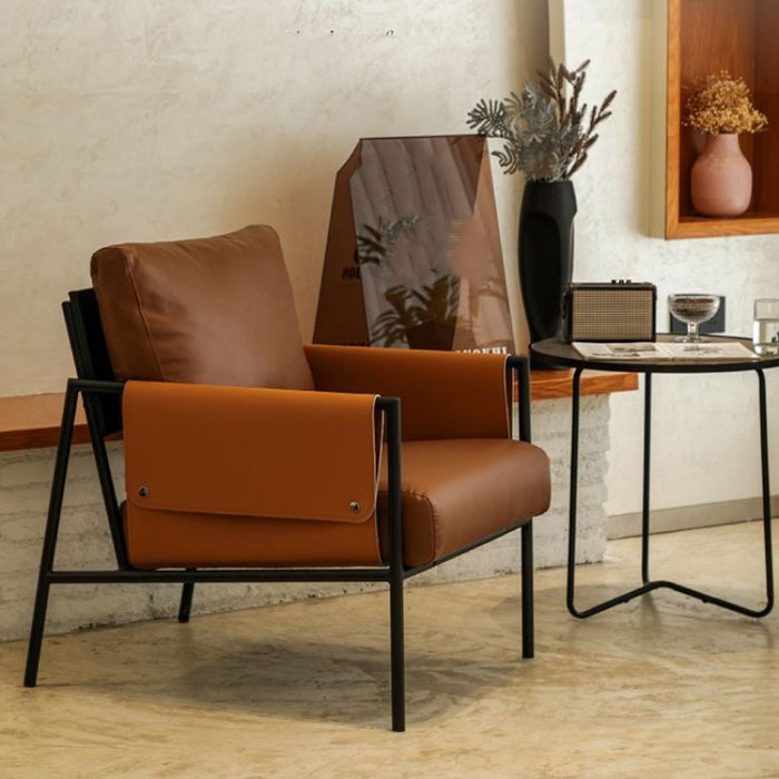 The Sedile Arm Chair combines sleek design with plush comfort, offering a modern and inviting seating solution for your living space.
