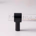 Clear acrylic pull bar with black cylindrical knob and decorative crystal beads on white background.