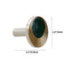 Brass and marble cabinet knob with dark green stone inset on white background.