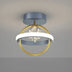 Modern brass and white LED ceiling light fixture mounted on gray ceiling.