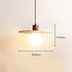 Travertine pendant light with wooden fixture and frosted globe, shown with dimensions 30cm diameter by 13cm height against a cream background.