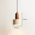 Travertine pendant light with wooden top detail suspended against a neutral beige background.