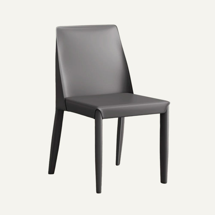 Vestitus Mid-Century Modern Dining Chair: Inspired by mid-century design, this dining chair boasts tapered legs and a curved backrest, adding a retro-inspired touch to your dining space.