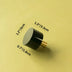 Black cylindrical knob with brass stem and white top on yellow background, dimensions labeled.
